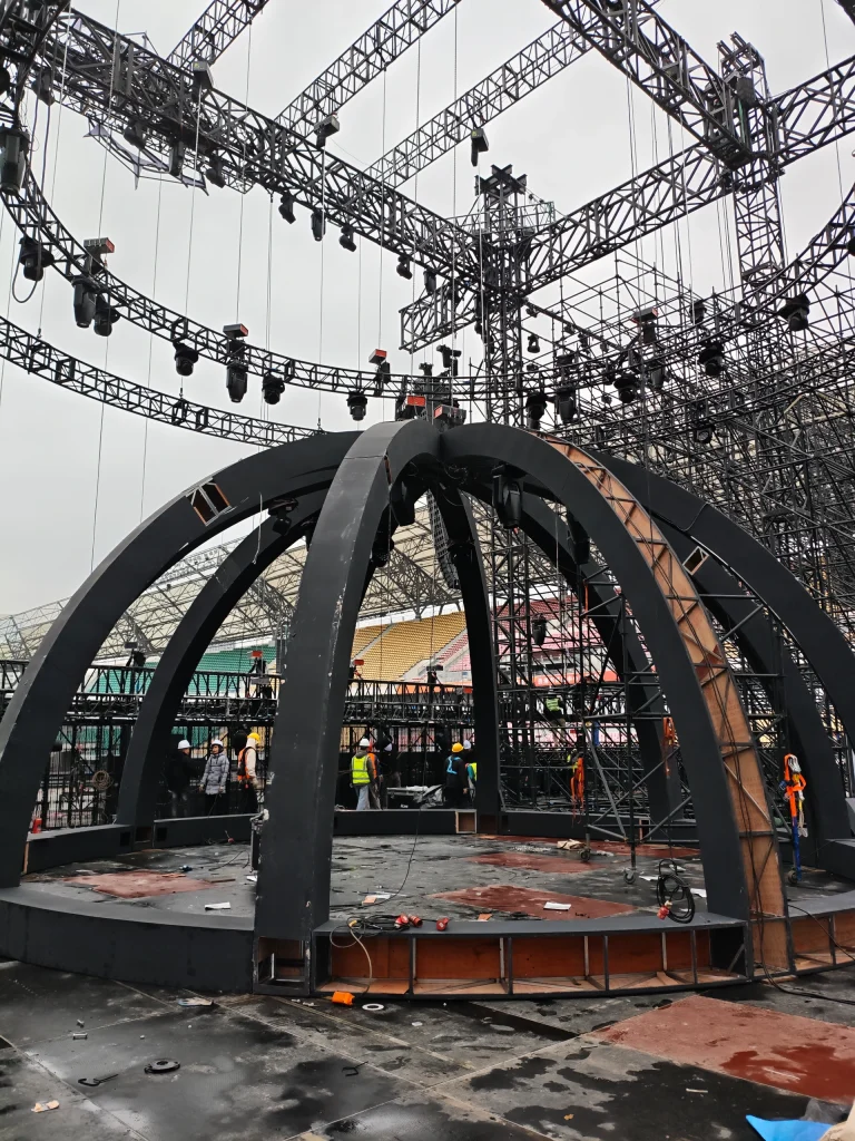 Coreat stage hoist system installed above concert venue truss structure